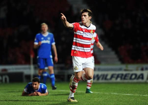 Doncaster Rovers' John Marquis celebrates scoring his second goal against Portsmouth. (
Picture: Jonathan Gawthorpe)