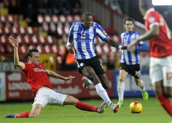 HELLO: Charlton's Morgan Fox, left, in action against Sheffield Wednesday, who he has now joined. Picture: Steve Ellis.