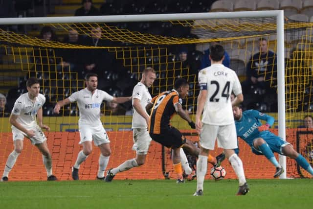 Hull City's Abel Hernandez scores his side's first goal (Photo: PA)