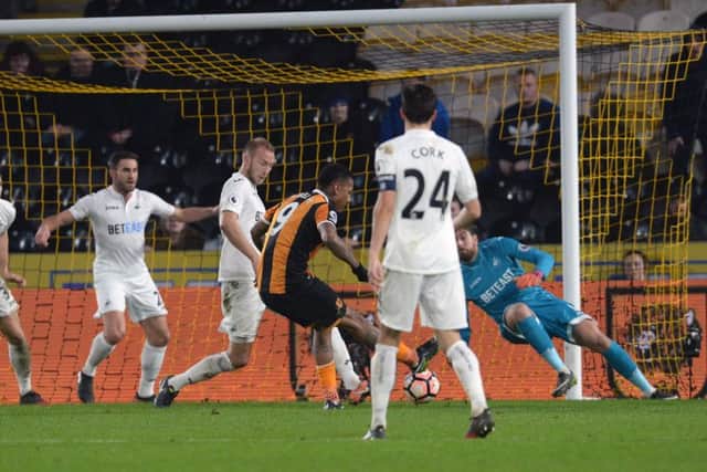 Hull City's Abel Hernandez scores his side's first goal during the Emirates FA Cup game v Swansea (Picture: PA)