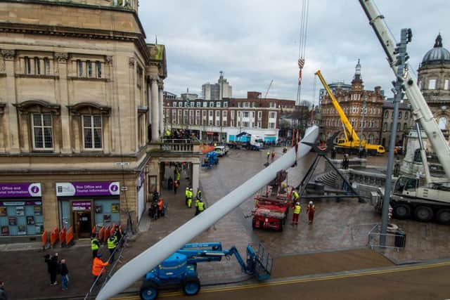 Date: 8th January 2017. Picture James Hardisty.
Installation of a 75m long Siemens Balde into Queen Victoria Square, Hull, by artist Nayan Kulkarni.
