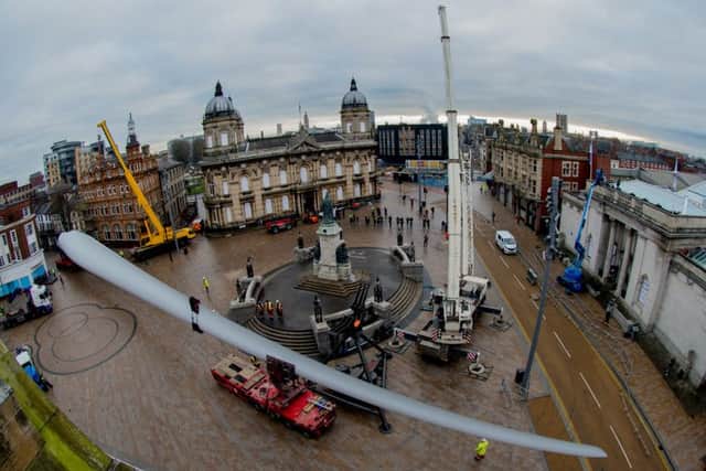 The scene in Queen Victoria Square this morning as a 75m Siemens blade is installed. Picture James Hardisty.