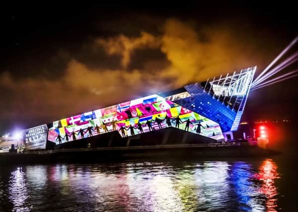 An art installation titled Arrivals and Departures by arts collective 'imitating the dog' is projected onto The Deep, in Hull, forming part of the Made in Hull series marking the official opening of its tenure as UK City of Culture.