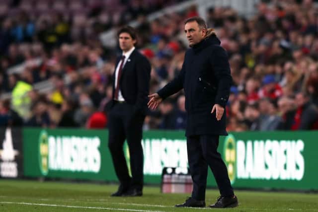 Sheffield Wednesday manager Carlos Carvalhal (right) and Middlesbrough manager Aitor Karanka on the touchline.
