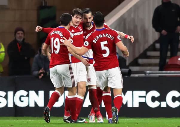 Middlesbroughs Alvaro Negredo, second right, is congratulated by team-mates after scoring their second goal in a 3-0 FA Cup third round triumph at home to Sheffield Wednesday (Picture: Simon Cooper/PA Wire).