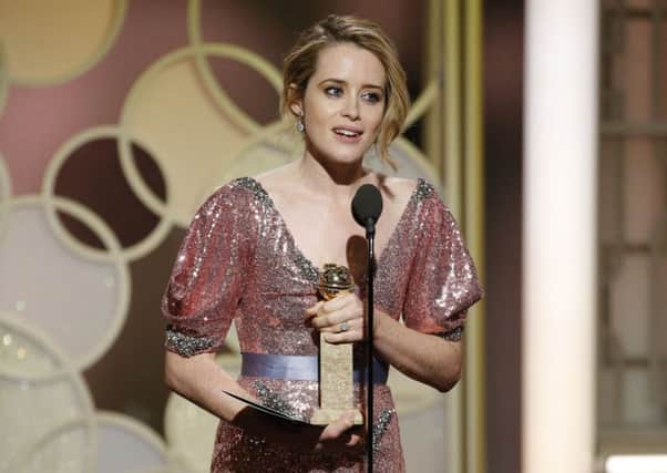 Claire Foy with the award for best actress in a TV series drama for "The Crown"
