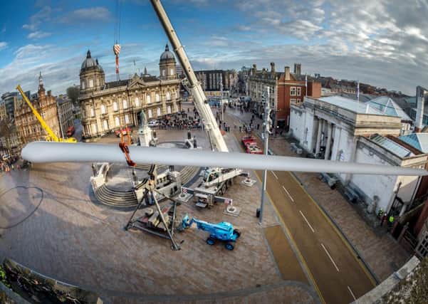 Installation of a 75m long Siemens Balde into Queen Victoria Square, Hull, by artist Nayan Kulkarni.  Picture James Hardisty.