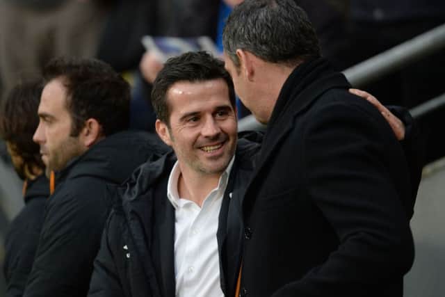 Hull City manager Marco Silva, left. Picture: Anna Gowthorpe/PA