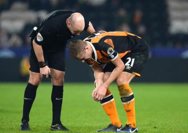 Michael Dawson has given Hull City fans a worry after limping off