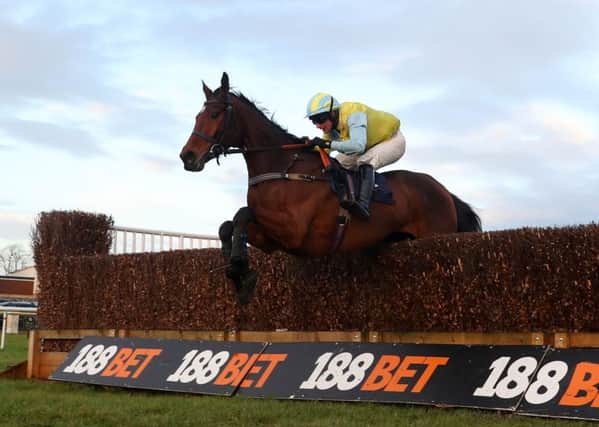 I Just Know, ridden by Danny Cook, jumps the last to win the Pegler Yorkshire Steeple Chase at Doncaster for Sue Smith (Picture: PA).