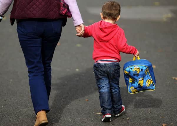 Embargoed to 0001 Tuesday January 10 File photo dated 13/10/15 of a child on the way to childcare. Thousands of new childcare places for young children are to be created under a Â£50 million scheme, ministers have announced. PRESS ASSOCIATION Photo. Issue date: Tuesday January 10, 2017. The move will help to deliver a Government pledge to offer three and four-year-olds in England 30 hours of free care a week, according to the Department for Education (DfE). See PA story EDUCATION Childcare. Photo credit should read: Niall Carson/PA Wire