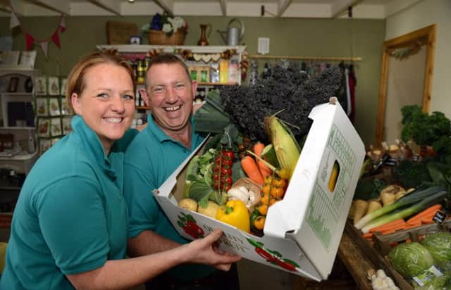 Charlotte and Jason Thompson of Bert's Barrow at Austfield Farm, Hillam with one of their veg boxes.   Picture: Gary Longbottom.