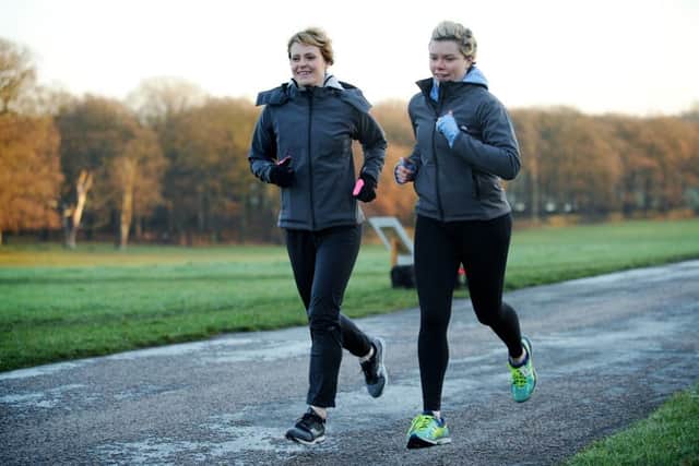 Former Olympic sprinter Emily Freeman (left) and lawyer Natalie Jackson have set up totally running, a programme working with schools to inspire girls who wouldn't normally do sport to get into running. Pictured Natalie helping one of the girls from Minsthorpe Community College at Nostell Park Run.
17th December 2016.
Picture : Jonathan Gawthorpe