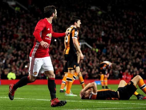 Juan Mata celebrates after putting Manchester United in front (Photo: PA)