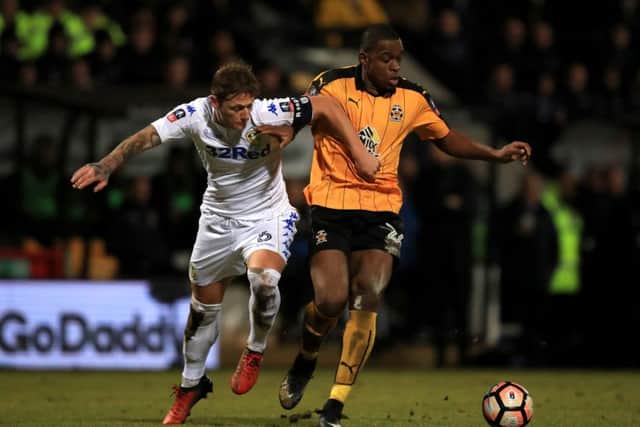 DOUBT: Leeds United's Liam Cooper was injured in Monday night's clash with Cambridge. Picture: Mike Egerton/PA