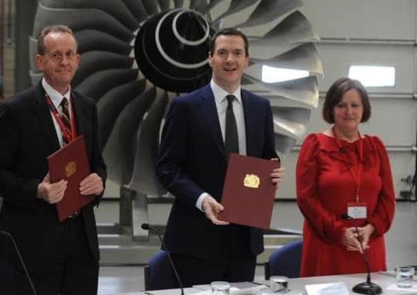 Barnsley Council leader Sir Steve Houghton, then chancellor George Osborne and Sheffield Council leader Julie Dore at the signing of the draft devolution deal in 2015