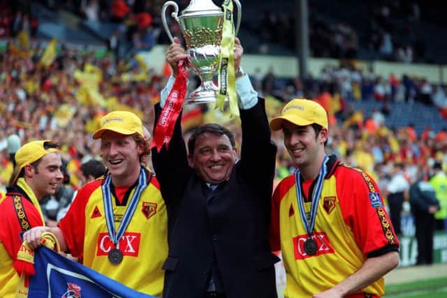 Watford manager Graham Taylor (centre) celebrates with his players after their 2-0 victory over Bolton Wanderers in the Nationwide Division One play-off final at Wembley in 1999.