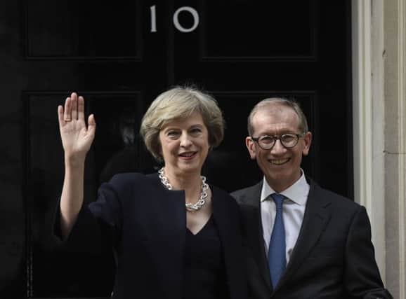 Theresa May with her husband Philip outside 10 Downing Street after she became Prime Minister.