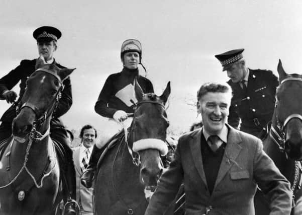 Red Rum, with jockey Brian Fletcher being led in by Donald "Ginger" McCain, his trainer at Aintree after becoming the first horse since "Reynoldstown" to win the Grand National in successive years. PRESS ASSOCIATION Photo. Issue date: Monday September 10, 2011. Aintree legend Ginger McCain, trainer of the great Red Rum, has died aged 80. McCain saddled Red Rum to win the Grand National three times, in 1973, 1974 and 1977, before winning the Aintree marathon for a fourth time with Amberleigh House in 2004.