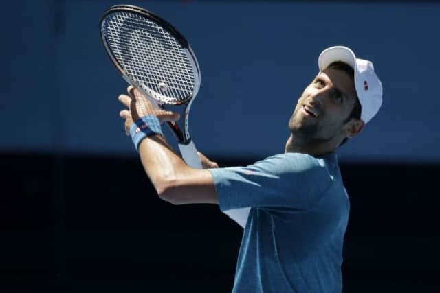 Serbia's Novak Djokovic stands in the way of both Andy Murray and Kyle Edmund in the 2017 Australian Open. (AP Photo/Mark Baker)