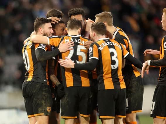 Hull City players celebrate their third goal (Photo: PA)