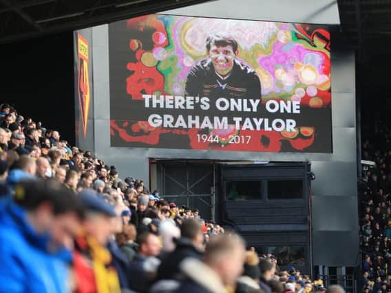 Both sets of supporters paid respects to Graham Taylor before the game (Photo: PA)