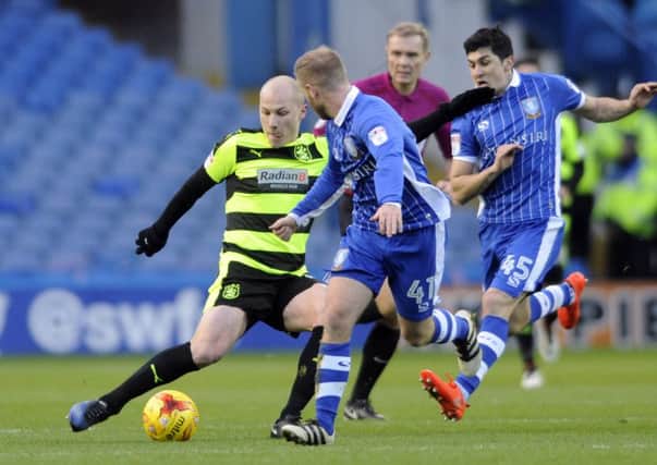 IN CONTROL: Midifield man Aaron Mooy dictated the game in the first half for Huddersfield Town at Hillsborough. Picture: Steve Ellis