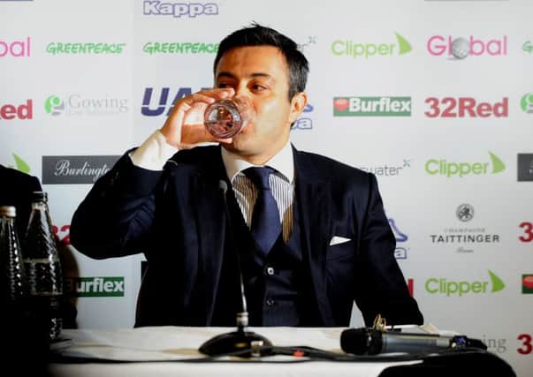 THIRSTY WORK: Andrea Radrizzani takes a break during his first Leeds press conference on Saturday. Picture: Simon Hulme.