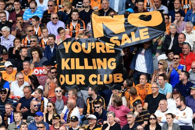 Hull City fans protest against the club's owners.