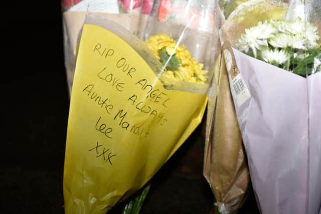 Floral tributes have been left after the body of teenageer Leonne Weeks was found on a pathway near Rotherham. Picture: Ross Parry Agency