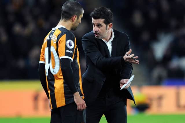 In charge: Hull head coach Marco Silva gives instructions to new signing Evandro against Bournemouth. (Picture: Jonathan Gawthorpe)