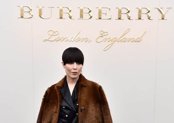 Noomi Rapace wearing Burberry. (Photo by Gareth Cattermole/Getty Images for Burberry)