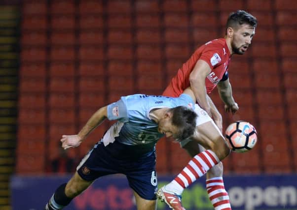Action from Barnsley's defeat to Blackpool on Tuesday night (Picture: Bruce Rollinson)