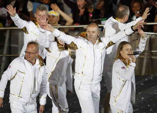 Sir Clive Woodward and members of the Great Britain Olympic team parade around the stadium during the London Olympic Games 2012 Opening Ceremony at the Olympic Stadium, London Photo:  Dave Thompson/PA Wire.