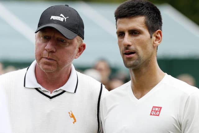 Novak Djokovic and Boris Becker. Picture: Jonathan Brady/PA.