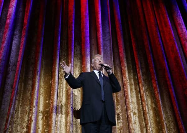 President-elect Donald Trump speaks during the presidential inaugural Chairman's Global Dinner