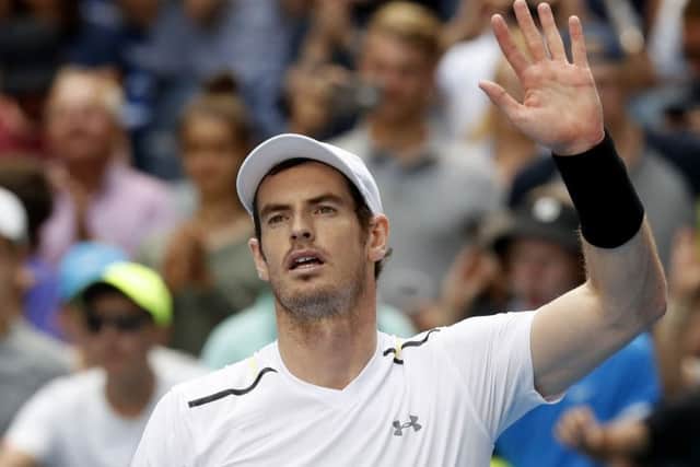 Britain's Andy Murray waves to the crowd after defeating United States' Sam Querrey in Melbourne. Picture: AP/Kin Cheung