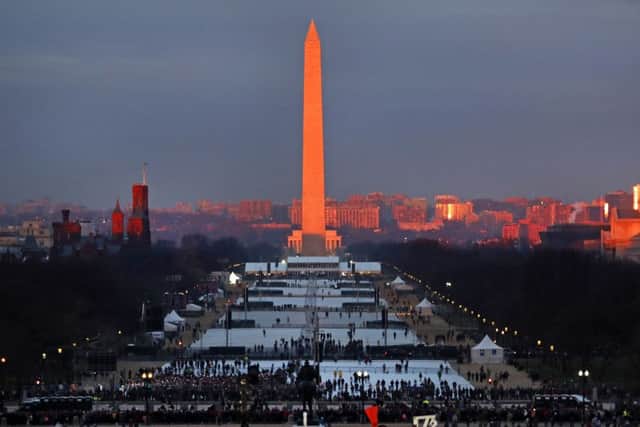 The crowd starts to fill the National Mall as the sun rises before the swearing in of Donald Trump as the 45th President of the Untied State