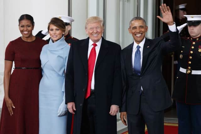 President Barack Obama and first lady Michelle Obama stand with President-elect Donald Trump and his wife Melania Trump at the White House