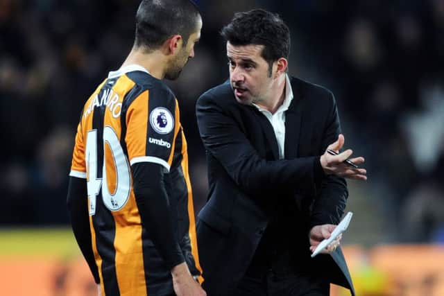 Hull's head caoch Marco Silva, gives orders to new signing Evandro.

 (Picture: Jonathan Gawthorpe)