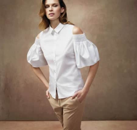 The reworked white shirt: Emily shirt in white cotton, ?79; chino in nutmeg, ?79. At Hobbs (also featuring more season key looks with the exposed shoulder and the fluted sleeves).