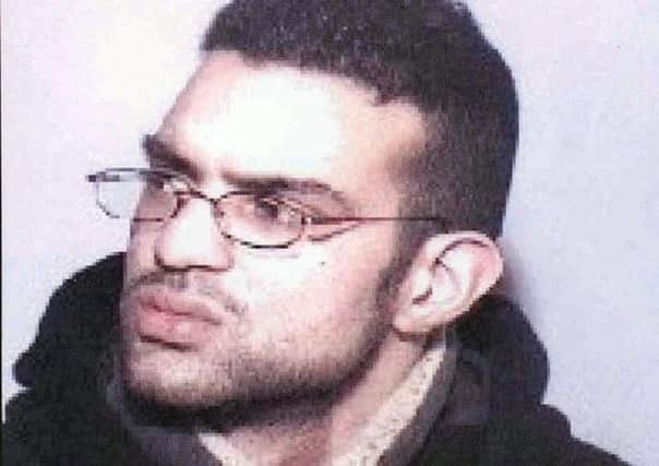 Shahid Mohammed was arrested over the fire that killed three generations of the same family in Birkby, Huddersfield, in May 2002.