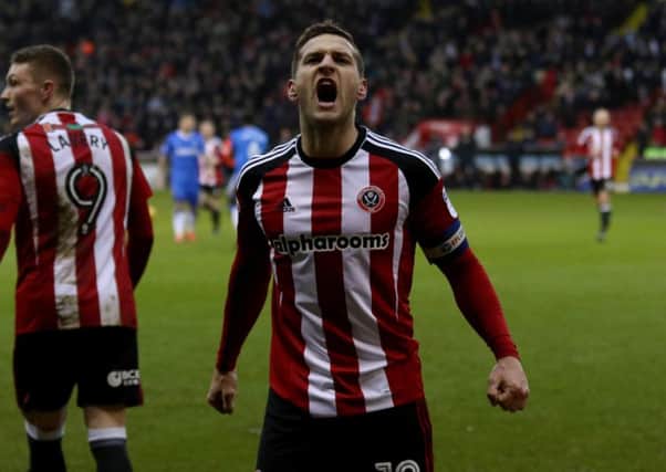 Billy Sharp of Sheffield United celebrates scoring his team's first goal. (Picture: Jamie Tyerman/Sportimage)