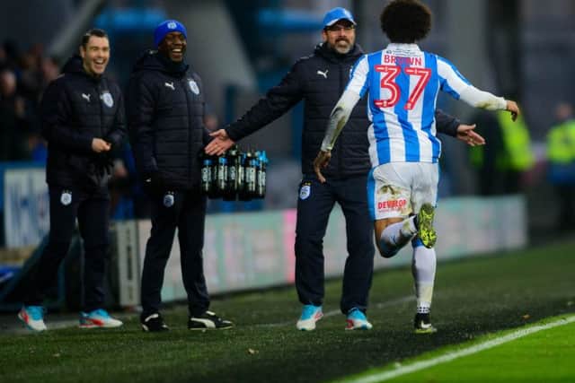 Izzy Brown celebrates his goal with head coach David Wagner (Picture: James Hardisty)