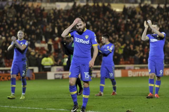 Luke Ayling, Stuart Dallas and Chris Wood at full time after Leeds United's defeat. (Picture: Bruce Rollinson)