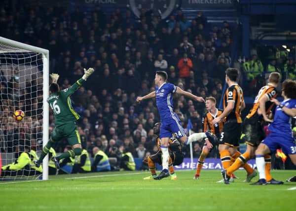 Chelsea's Gary Cahill (centre) scores his side's second goal of the game. Picture: Nick Potts/PA