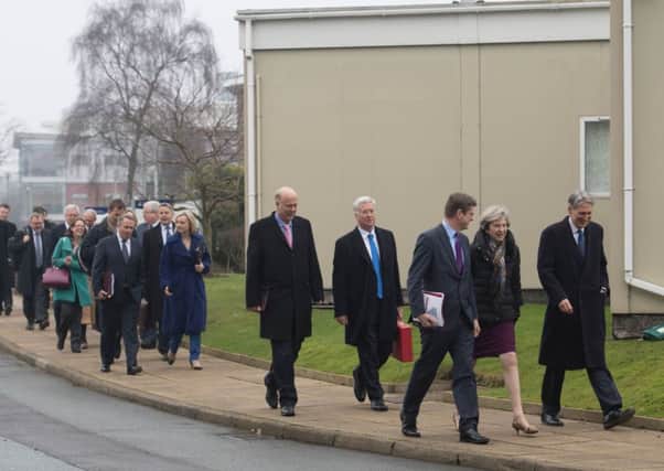 Theresa May and the Cabinet arrive in the North West to launch the Government's Industrial Strategy.