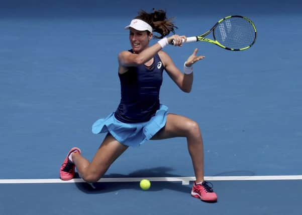 In-form: Britains Johanna Konta makes a forehand return to Russias Ekaterina Makarova during her fourth-round victory. (Picture: Aaron Favila/AP)