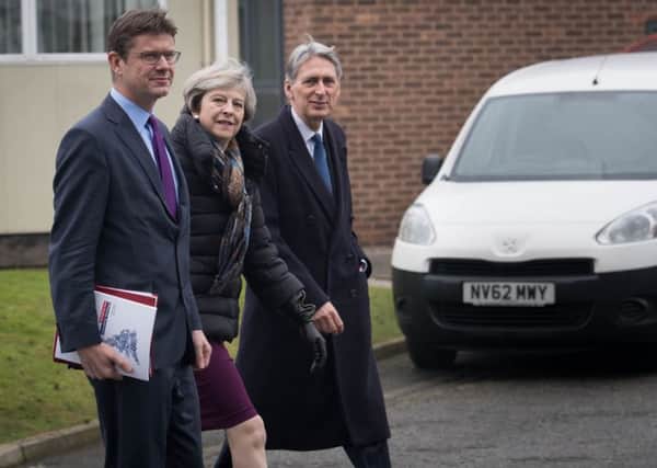 Business Secretary Greg Clark arrives at a Cabinet meeting with Prime Minister Theresa May and Chancellor Philip Hammond to launch the Government's Industrial Strategy.