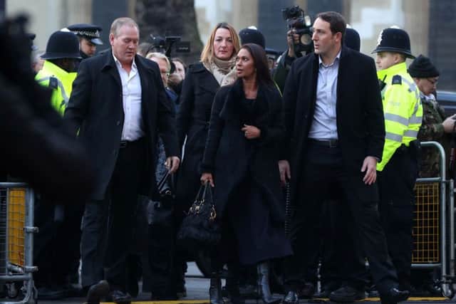 Gina Miller (centre) arriving at The Supreme Court, London